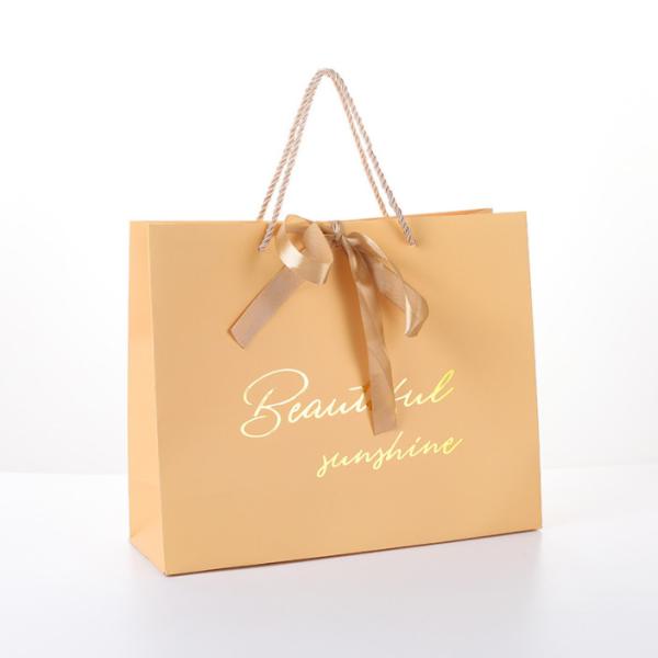 Shopping Boutique Paper Gift Bags 300gsm With Bronzing Printed Logo Ribbon Handle