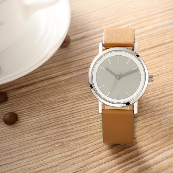 Кварц высокой точности женщин наблюдает гарантию 12 месяцев с диапазоном кожи Брауна