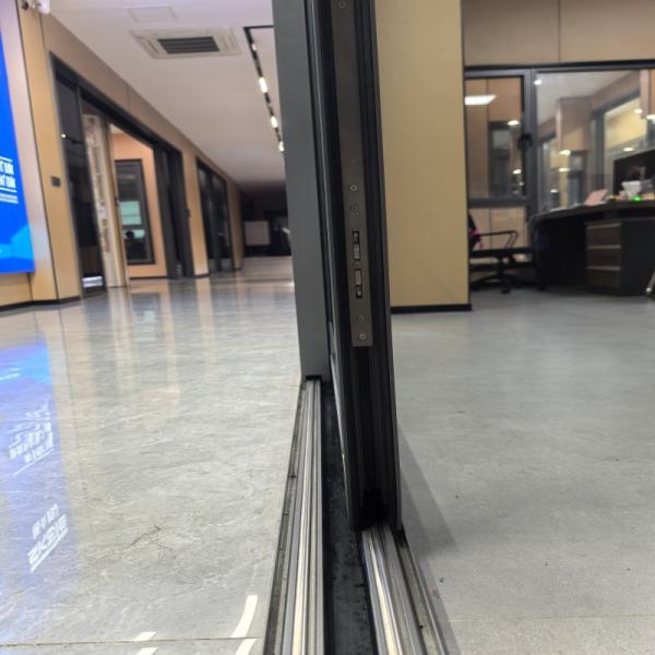 Porte hydraulique en aluminium élévateur et coulissante pour maisons et bureaux