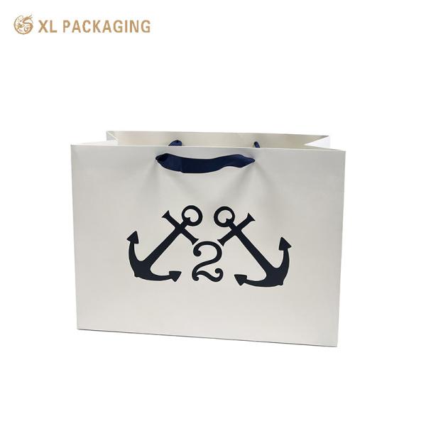 XL Packaging Custom Packaging Factory White Paper Packaging Bags Gold Foil Kraft Paper Clothes Shoes Shopping Bag With Handle