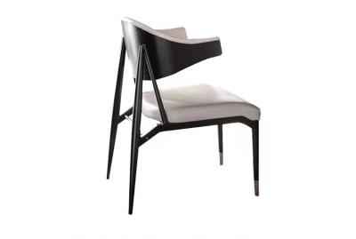 590*607mm Hotel Restaurant Furniture ODM Black And White Leather Dining Chairs With Arms