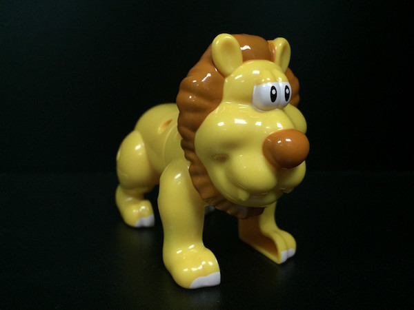 ABS Material Plastic Animal Figures , Lion Figure Toy With An Blue Pencil