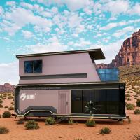 Maison capsule mobile avec balcon blanc pour le village