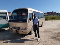 30 Seater Toyota Coaster Bus Japanese Mini Bus Open The Door Outside
