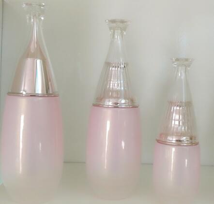 Bouteilles cosmétiques en verre attrayantes de pompe bouteille/100ml de pompe/couleur emballage cosmétique diverse