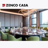 The Hotel Restaurant Furniture Includes A Swivel Marble Round Table And Green Leather Dining Chairs