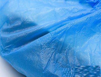 Light Blue Disposable Shoe Covers Elasticized Seam Fluid Resistant With Textured Tread