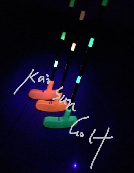 mini fluorescent golf putter in black light (glow in uv light ), mini golf putter