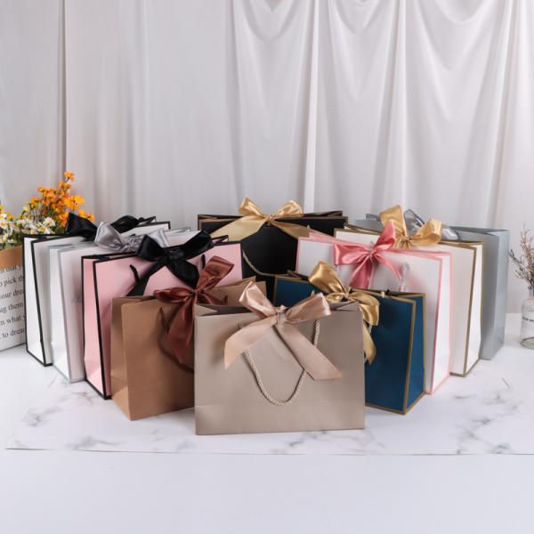 Sac shopping en papier avec nœud papillon pour cosmétiques, sac cadeau multicolore pour emballage de vêtements avec impression de logo