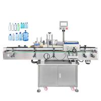 Ym510 máquina de etiquetado de la botella redonda del plástico 30m m para el agua mineral