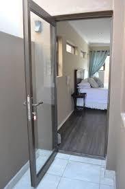 Porta articulada Bifold da liga de alumínio para balançar a dobradiça de porta de vidro do quadro da dobradiça de porta do quadro aberto da resistência da poeira da maneira