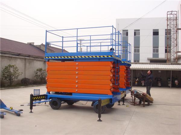 L'ascenseur hydraulique électrique mobile de ciseaux au-dessus de la taille protègent 300kg la capacité 16m
