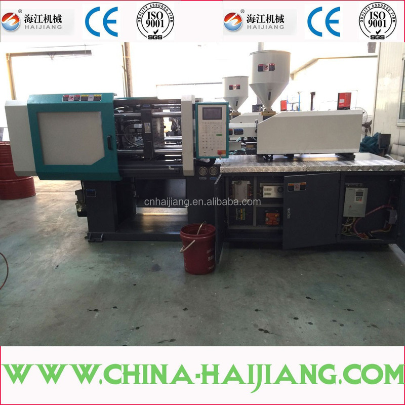 Blue And White rotary shaft two color injection molding machine featuring 380V 50Hz 3Phase power supply suitable for multi color plastic molding