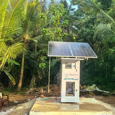 Dispensador de agua solar autoservicio con monedas y ósmosis inversa