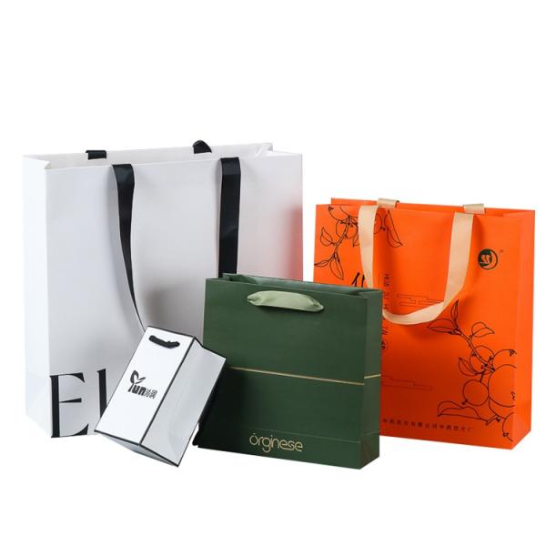Customized Logo Accepted Ivory Board Paper Bags for Boutique Requirement