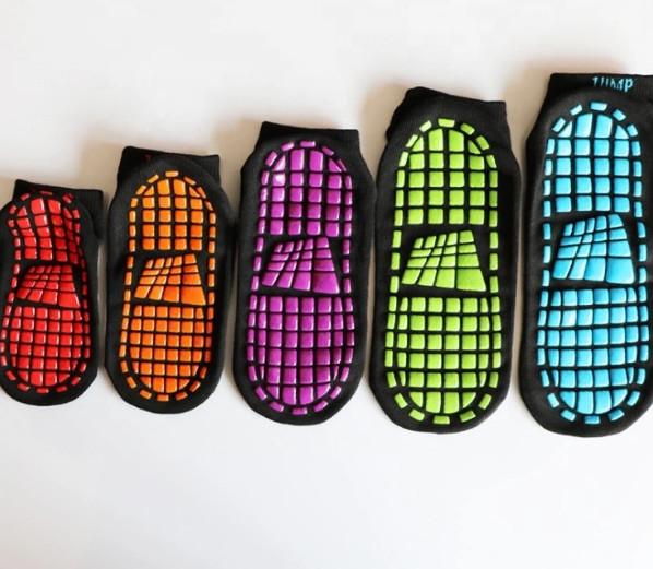 Eco - Friendly Kids Trampoline Socks Jacquard Logo Action City Bounce Socks Silicone Non Slip Socks