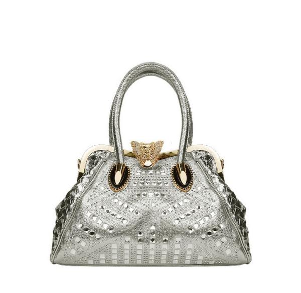 The new 2016 spring and summer fashion classic rhinestone butterfly buckle shoulder bag female bag Europe and shells