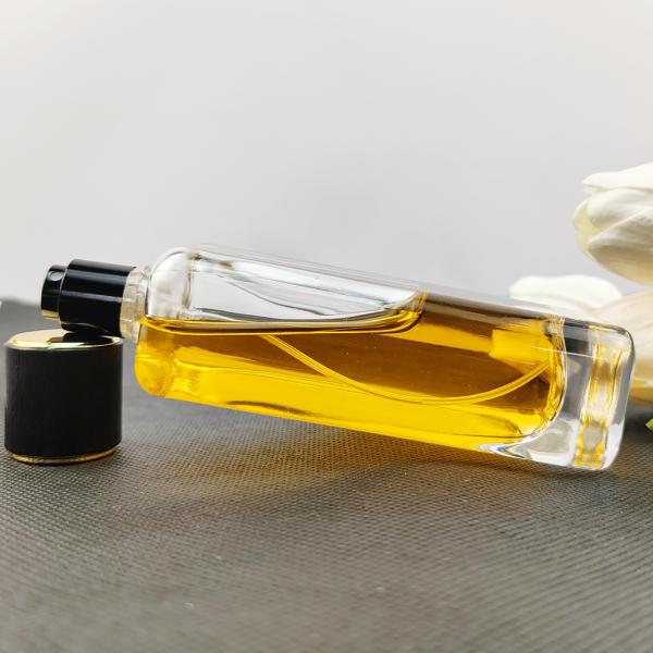 Material de base Vidrio 100 ml Botella de perfume de aroma de lujo con logotipo personalizado