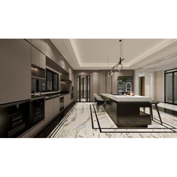 Cuisine en acier inoxydable de luxe en forme de U avec une île impressionnante