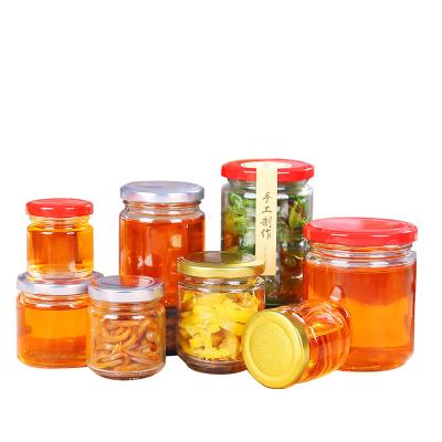 Frasco de vidro do mel da etiqueta sem chumbo do selo com forma redonda de produto comestível da tampa da lata