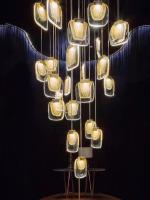 Nordic Light Luxury Designer LED Light Strip Crystal Glass Pendant Lamp Pour le salon salle à manger Villa Escalier