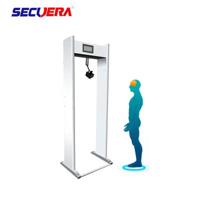 Caminhada do quadro de porta com a medida da temperatura do detector de metais para supermercados
