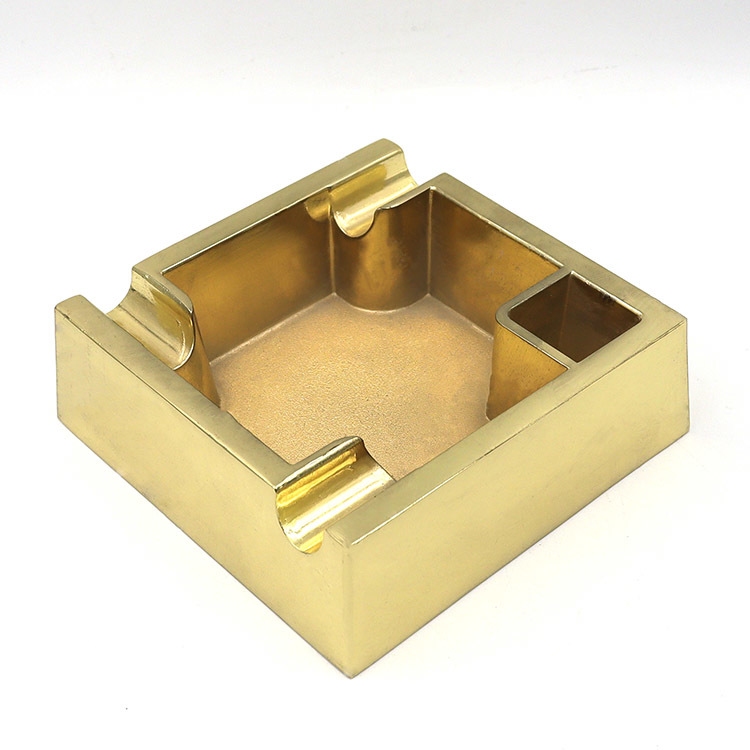 Square polished gold metal ashtray with multi-groove design and independent storage compartment for luxury decor