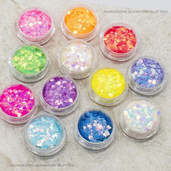 Artesanía de uñas ecológica creativa estrellas formas de corazón mezclas gruesas calidad cosmética brillo polvo a granel para maquillaje navideño