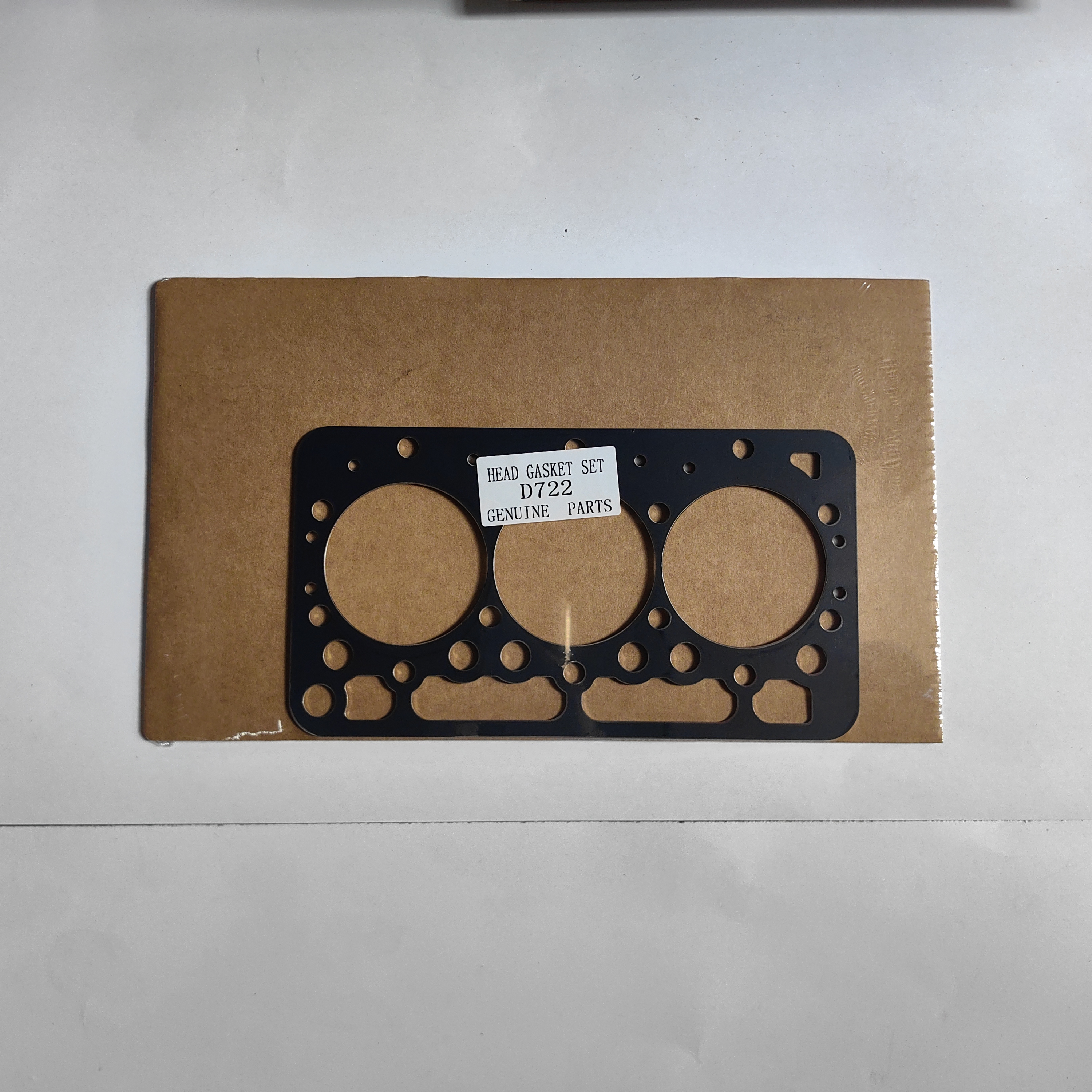 High quality metal cylinder head gasket compatible with Kubota D722 diesel engine.