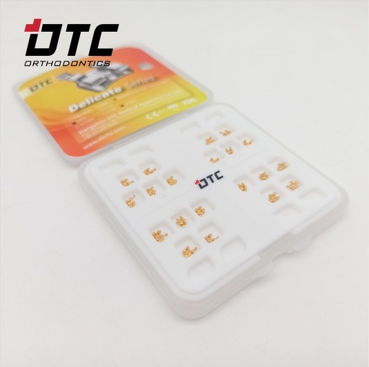 Experience the Best Orthodontic Treatment with DTC Ortho's CE Certified Gold Brackets