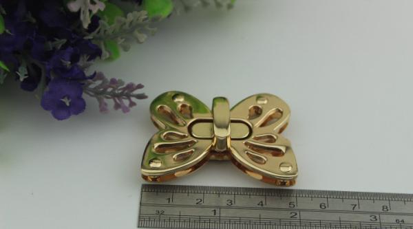 Shiny gold metal zinc alloy butterfly pattern fashion purse turn locks