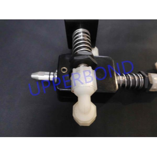 Papier à cigarettes traité par magnétite inclinant l'applicateur de colle