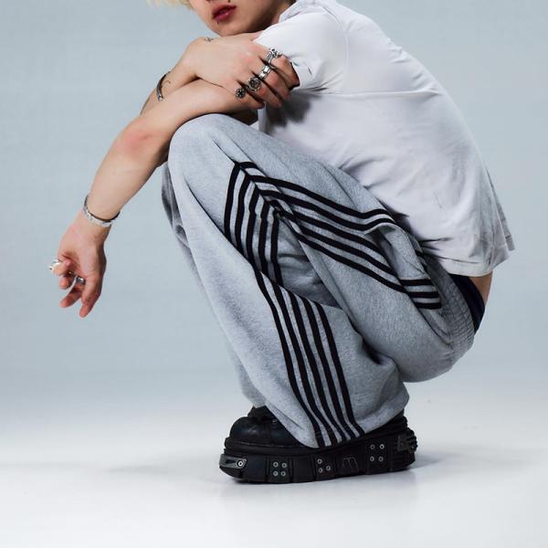 Fabricantes de prendas de vestir personalizados de alta calidad lavado en blanco con ácido apilado 100 algodón apilado sudaderos piernas rectas con rayas