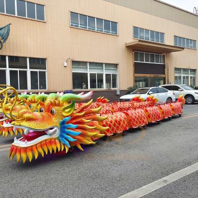 Tren eléctrico de dragón chino personalizado para parques temáticos 350W 100kg de carga