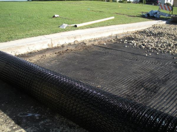 Polymer Coated Fiberglass Geogrid for Biaxial Warp Applications in 50m-100m Rolls