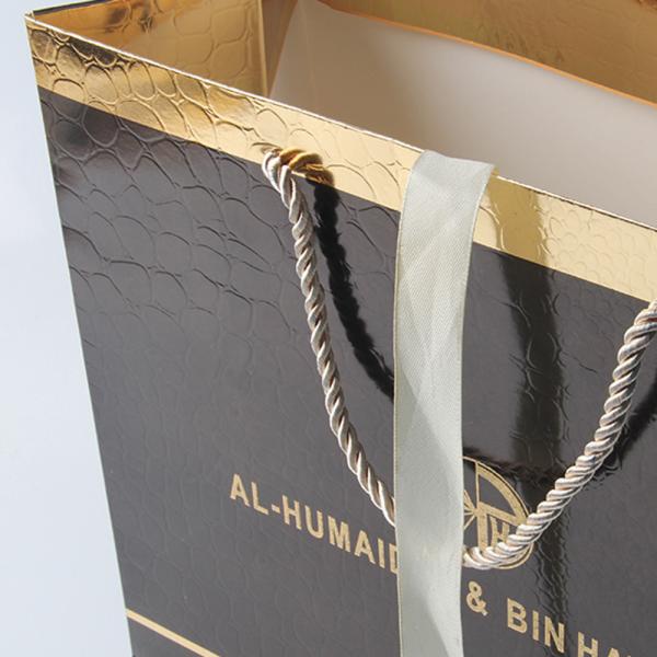 Luxury Glossy Black Gift Bags With Foil Hot Stamping And PP Rope Handle