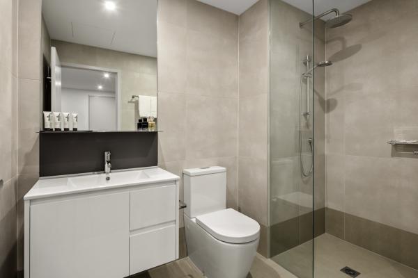 Budget hotel bedroom furniture of PU leather upholstery bed and Laminate desk with TV cabinets