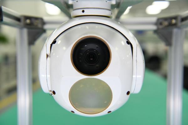 Dual Sensor Electro Optical Tracking UAV Payload Over 15km Detection