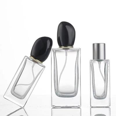 Square Glass Perfume Bottle with 50ml 100ml Capacity and Distinctive Irregular-shaped Cap
