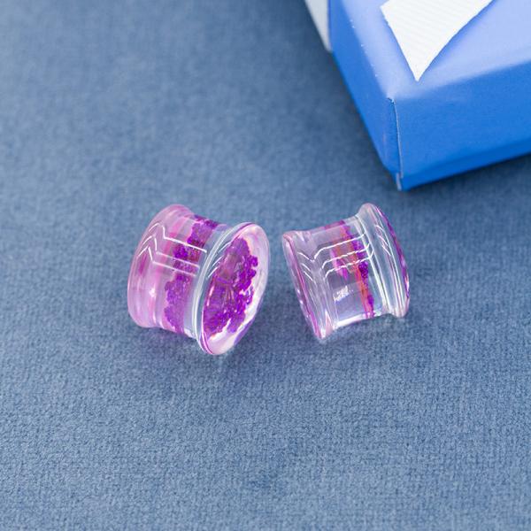 A tomada acrílica da orelha escava um túnel a flor secada roxo da joia 25mm para dentro