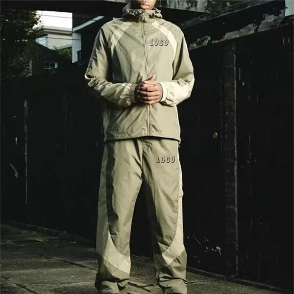 Broderie personnalisée logo polyester imperméable Tracksuit pour hommes patchwork nylon windbreaker veste jogging pantal
