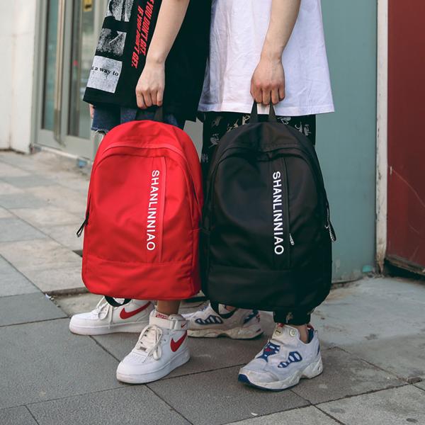 Korean version of pure color high school students backpack campus men and women cool backpack