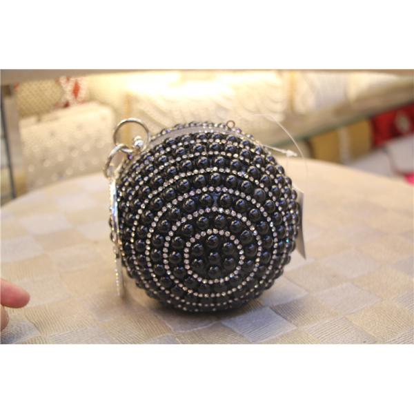 Round high-grade pearls evening bags woman holding a high-end fashion evening bag bride