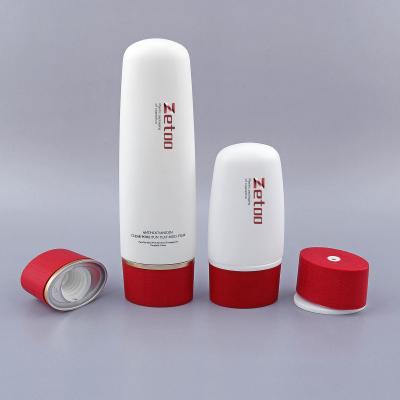 50ml / 100ml Plastic Cosmetic Bottle Oval PET Cosmetic Bottle With 40mm Diameter Cap