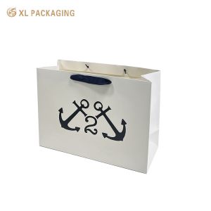 Custom Matte Black Clothing Paper Bags with Reinforced Construction and Full-Surface Logo Printing for Luxury Gift Packaging