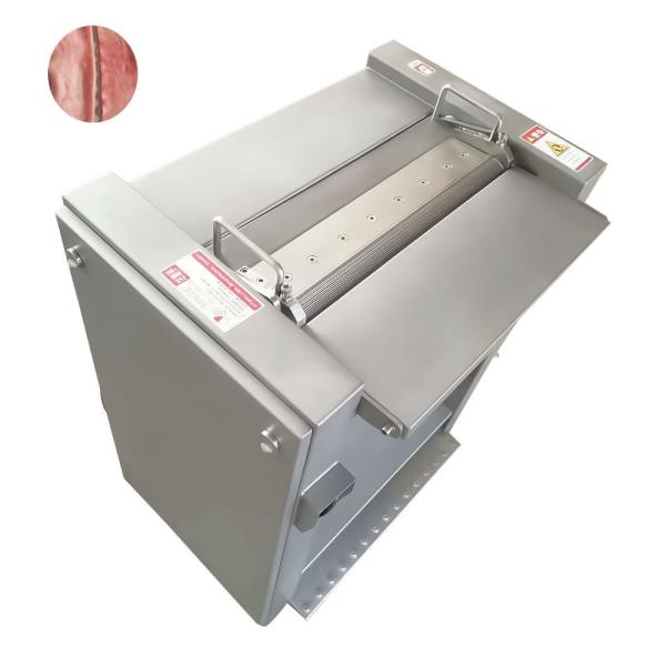 Machine à éplucher les peaux de porc