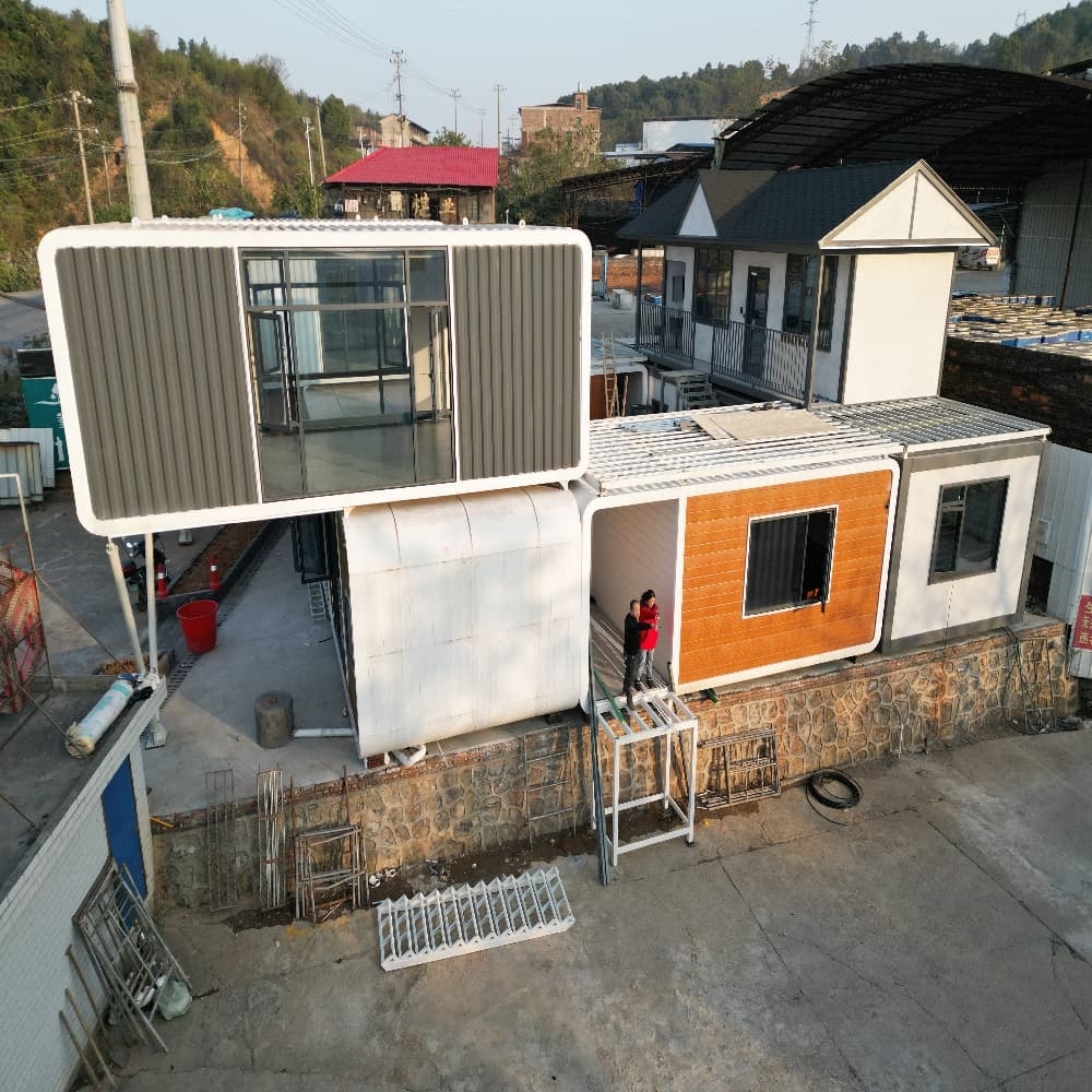 Customized Steel Structure Buildings Appleand Podspace Capsule and House by
