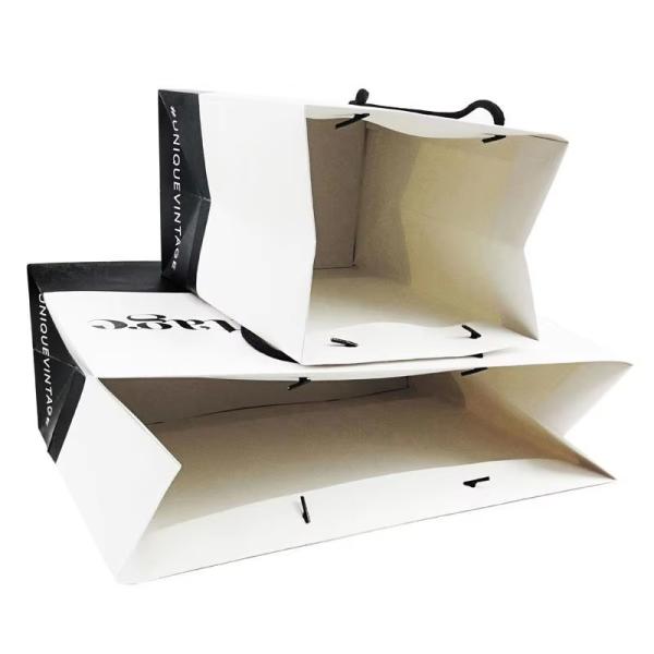 Emballage en gros et en vente au détail sur mesure Sacs en papier Sacs-cadeaux de luxe pour les achats Sacs-cadeaux avec poignées pour bijoux Petite entreprise commerciale