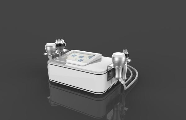 FDA/CE approved 4 handles 100 w 40 K focused cavitation tripolar multipolar bipolar rf machine for beauty spa