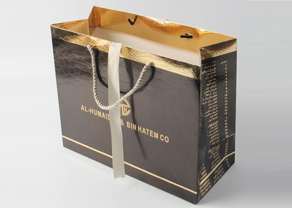 Luxury Glossy Black Gift Bags With Foil Hot Stamping And PP Rope Handle